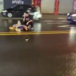 A Couple Hit by a Car After a Crash 1