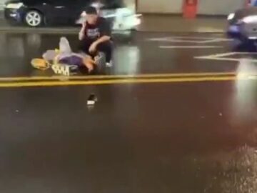 A Couple Hit by a Car After a Crash 6