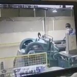 A Man Pulled into a Pressing Machine 2