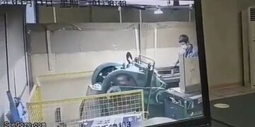 A Man Pulled into a Pressing Machine 13