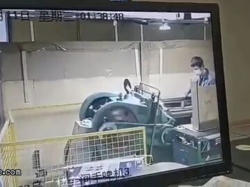 A Man Pulled into a Pressing Machine 5