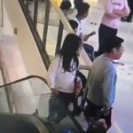 Girl Thrown by an Escalator 2