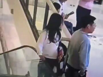 Girl Thrown by an Escalator 22