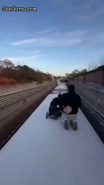 A Group of Men Risking Their Life on a Moving Train 1