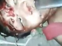 Men Shoves Machete Into the Face of a Dead Woman 6