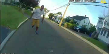 Man with a Hammer Charges at Cop and Get Shot 11