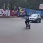 Girl on Electric Scooter Loses Control 7
