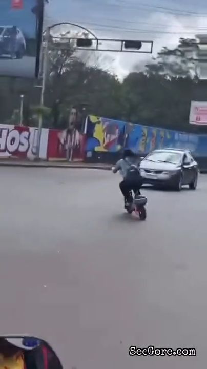 Girl on Electric Scooter Loses Control 3