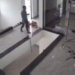 Man Casually Walks into a Hole on the Floor 7